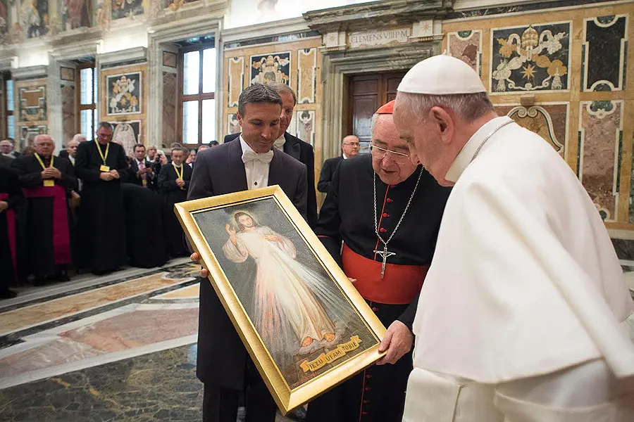 Pope Francis is presented an image of the Divine Mercy by members of the John Paul II Foundation, April 25, 2015. Credit: L'Osservatore Romano.