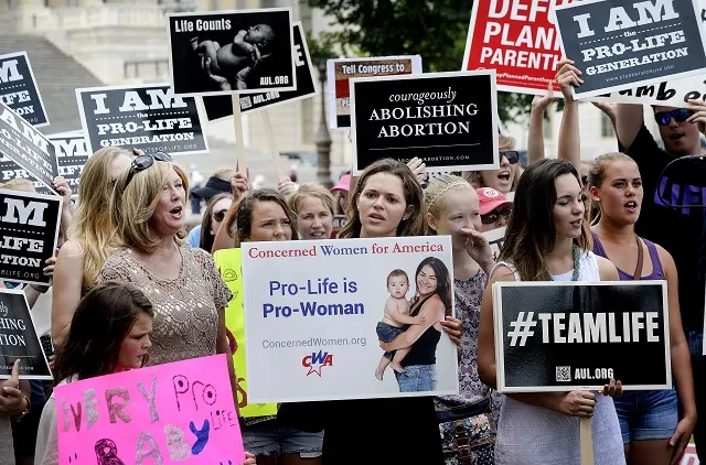 Rally held in support of cutting Planned Parenthood funding. Credit: Olivier Douliery/Getty Images.