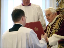 Pope Benedict XVI announced his intention to resign the papacy during a meeting of cardinals Feb. 11, 2013. The surprise announcement, which he made in Latin, took place in the Hall of the Consistory in the Vatican's apostolic palace.
