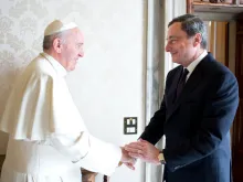  Pope Francis greets Mario Draghi at the Vatican on Oct. 19, 2013. Credit: Vatican Media.