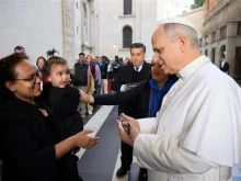 Nadia Howlader is given a key to a new apartment by Pope Leo XIV on Nov. 16, 2025, on the ninth World Day of the Poor.