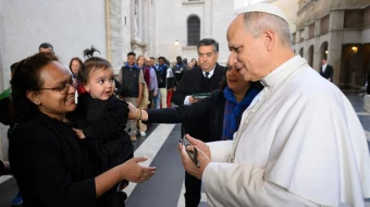 Nadia Howlader is given a key to a new apartment by Pope Leo XIV on Nov. 16 on the ninth World Day of the Poor.
