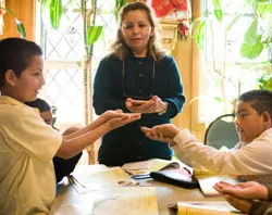 Nicolasa Chacon teaches third graders how to receive the Eucharist  ?w=200&h=150