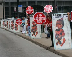 Pro-lifers protest the UW plan to perform late-term abortions.?w=200&h=150