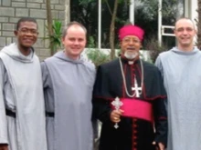 The three brothers of St. John working in Addis Ababa pose with Archbishop Souraphiel. 