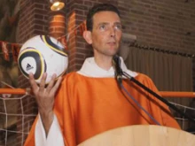 Fr. Paul Vlaar during the World Cup-themed Mass he presided over.