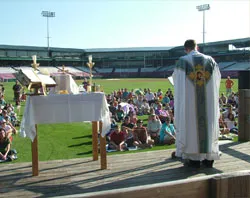 Fr. Paul Fasano celebrates Mass in the Kane County Cougars stadium.?w=200&h=150