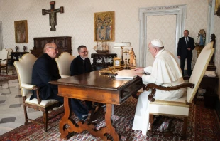 Fr. Pierluigi Maccalli, center, meets Pope Francis at the Vatican Nov. 9, 2020.   Vatican Media.