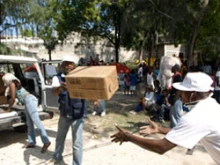 CRS workers unload aid packages in Port-au-Prince. 