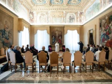 Pope Francis addresses relatives of those killed in a nightclub stampede in 2018 at the Vatican Sept. 12, 2020. 