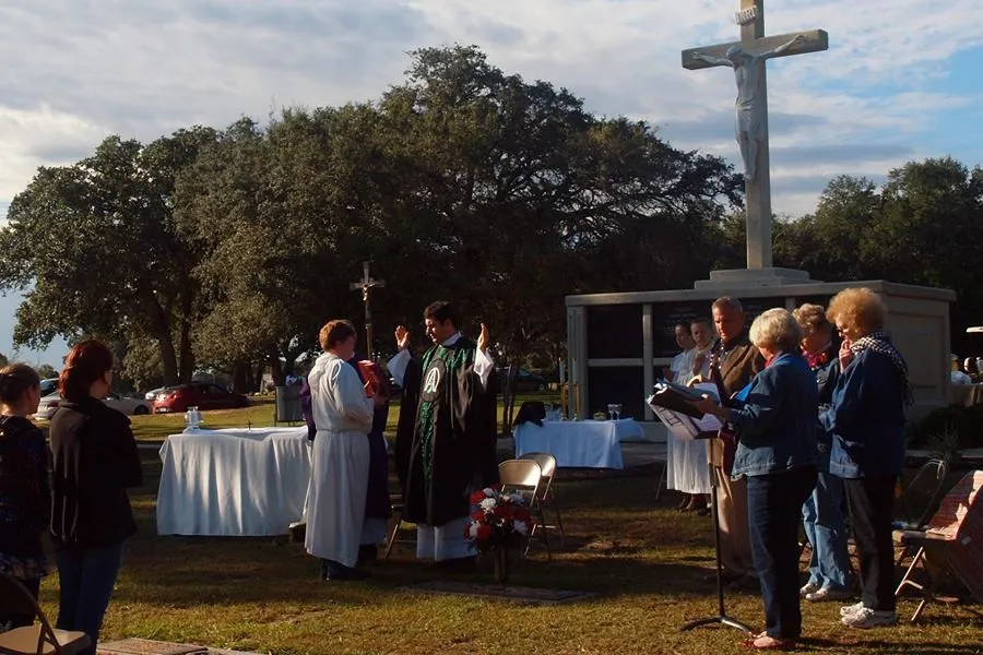 All Souls Day Mass in a Catholic cemetery in Mobile Alabama.?w=200&h=150