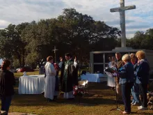 All Souls Day Mass in a Catholic cemetery in Mobile Alabama.