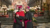 Archbishop Tadeusz Wojda of Gniezno, president of the Polish Bishops’ Conference (left), and Bishop Georg Bätzing, president of the German Bishops’ Conference, embrace after signing the joint declaration “Courage of Extended Hands” at the Cathedral of St. John the Baptist in Wrocław, Poland, on Tuesday, Nov. 18, 2025, during commemorations of the 60th anniversary of the historic correspondence between the Polish and German Bishops’ Conferences.