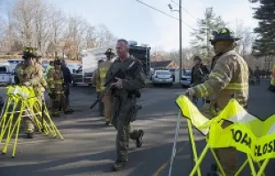 Connecticut State Police walk near the scene of an elementary school shooting on Dec. 14, 2012 in Newtown, Connecticut.   Douglas Healey/Getty Images News/Getty Images.