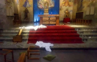 The vandalized altar of Christ the King parish in Gothenburg, Sweden.   Diocese of Stockholm.