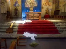 The vandalized altar of Christ the King parish in Gothenburg, Sweden. 