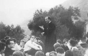1960. Varigotti (SV). Father Luigi Giussani with students during the Tower Ray.   Communion and Liberation Official Site.