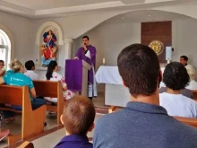 Mass in the Chapel of Nossa Senhora Unatadora dos Knots and Sagrada Familia, in Várzea Grande, in Mato Grosso state, Brazil.