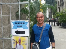 Fr. Marcello Pondoc outside Manila's cathedral, Jan. 15, 2015. 