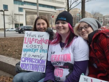 Participants in the 2014 March for Marriage stand outside the Supreme Court building in Washington, D.C., June 19, 2014. 