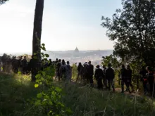 Bishops and youth auditors from the synod walk the Via Francigena in Rome, Oct.25, 2018. 