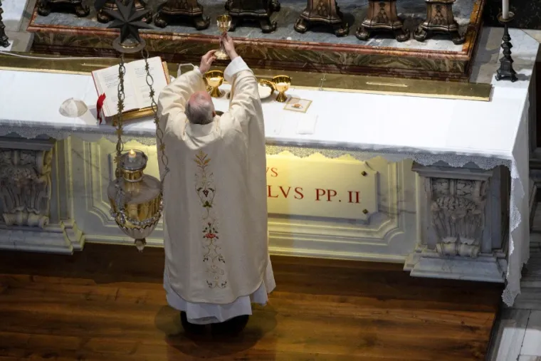 Pope Francis celebrates Mass at the tomb of St. John Paul II in St. Peter’s Basilica May 18, 2020. Credit: Vatican Media