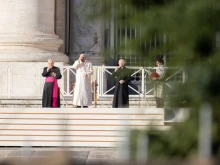 Pope Francis praying at the general audience on St. Peter's Square