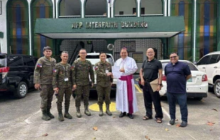 Bishop Elias Ayuban Jr. of Cubao hands over a letter of support to Armed Forces of the Philippines (AFP) Chief of Staff Romeo Brawner Jr. at Camp Aguinaldo, Manila on Nov. 14, 2025. Credit: Clergy For Good Governance