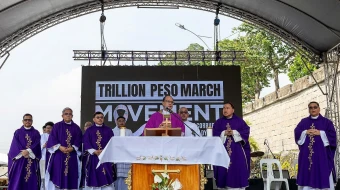 Cardinal Pablo Virgilio David with other bishops and clergy after celebrating Mass at the EDSA People Power Monument, Nov. 30, 2025, in Manila.