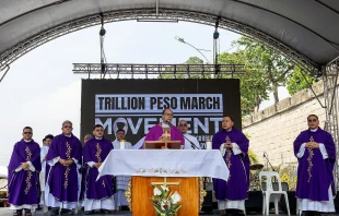 Cardinal Pablo Virgilio David with other bishops and clergy after celebrating Mass at the EDSA People Power Monument, Nov. 30, 2025, in Manila. Credit: Santosh Digal