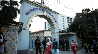 Army personnel stand guard in front of St. Mary’s Cathedral Church in Dhaka, Bangladesh, on Dec. 23, ahead of Christmas 2024.