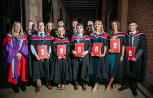 Graduates pose with their degrees at St. Mary’s University College in Belfast, Northern Ireland. Credit: St. Mary’s University College