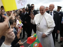 Pope Francis greets pilgrims near the Shrine of Our Lady of Fatima during the 100th anniversary celebration of the Fatima apparitions on May 12, 2017.