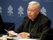 Cardinal Jean-Claude Hollerich, relator general of Synod on Synodality, speaks to the media on June 20, 2023, at the temporary headquarters of the Holy See Press Office in Vatican City.