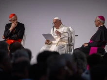 Pope Francis speaks at the 50th annual Social Week of Catholics in Trieste, Italy, on the morning of July 7, 2024. At his arrival in the northern Italian city, he was greeted by Archbishop Luigi Renna, president of the organizing committee (right), and Cardinal Matteo Maria Zuppi, president of the Italian bishops' conference (left).