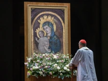 Cardinal Víctor Manuel Fernández, prefect of the Dicastery for the Doctrine of the Faith, prays before an image of the Blessed Virgin Mary and Child during the rosary vigil for Pope Francis at the Vatican on Feb. 28, 2025.