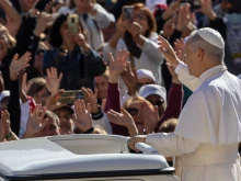 Pope Leo XIV greets pilgrims gathered in St. Peter’s Square at the Vatican on Sept. 27, 2025.