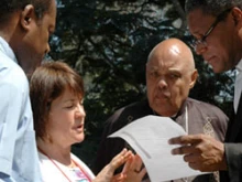 Caritas Internationalis Director Lesley-Anne Knight meets with Haitian clergy to plan continued relief effort. 