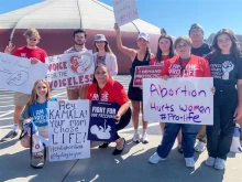Lydia Taylor (blue shirt), and other student pro-life protesters from across the state of North Carolina traveled to North Carolina A&T University in Greensboro on Sept. 15, 2023, to demonstrate outside of Vice President Kamala Harris's speech calling for the expansion of abortion access.