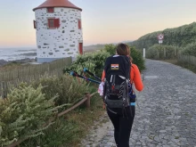 Female pilgrim on Camino Portuges de la Costa, Portugal, August 2021.