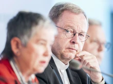 Bishop Georg Bätzing watches ZdK president Irme Stetter-Karp speak at the Synodal Way assembly in Frankfurt, Germany, Sept 8. 2022
