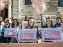 Participants in a women’s march on Westminster highlighting 100,000 alive today because of Northern Ireland’s abortion laws, Feb. 26, 2019. 