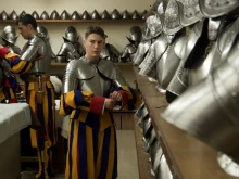 Swiss Guard cadets prepare their armor in the guards' barracks at the Vatican on April 30, 2024.