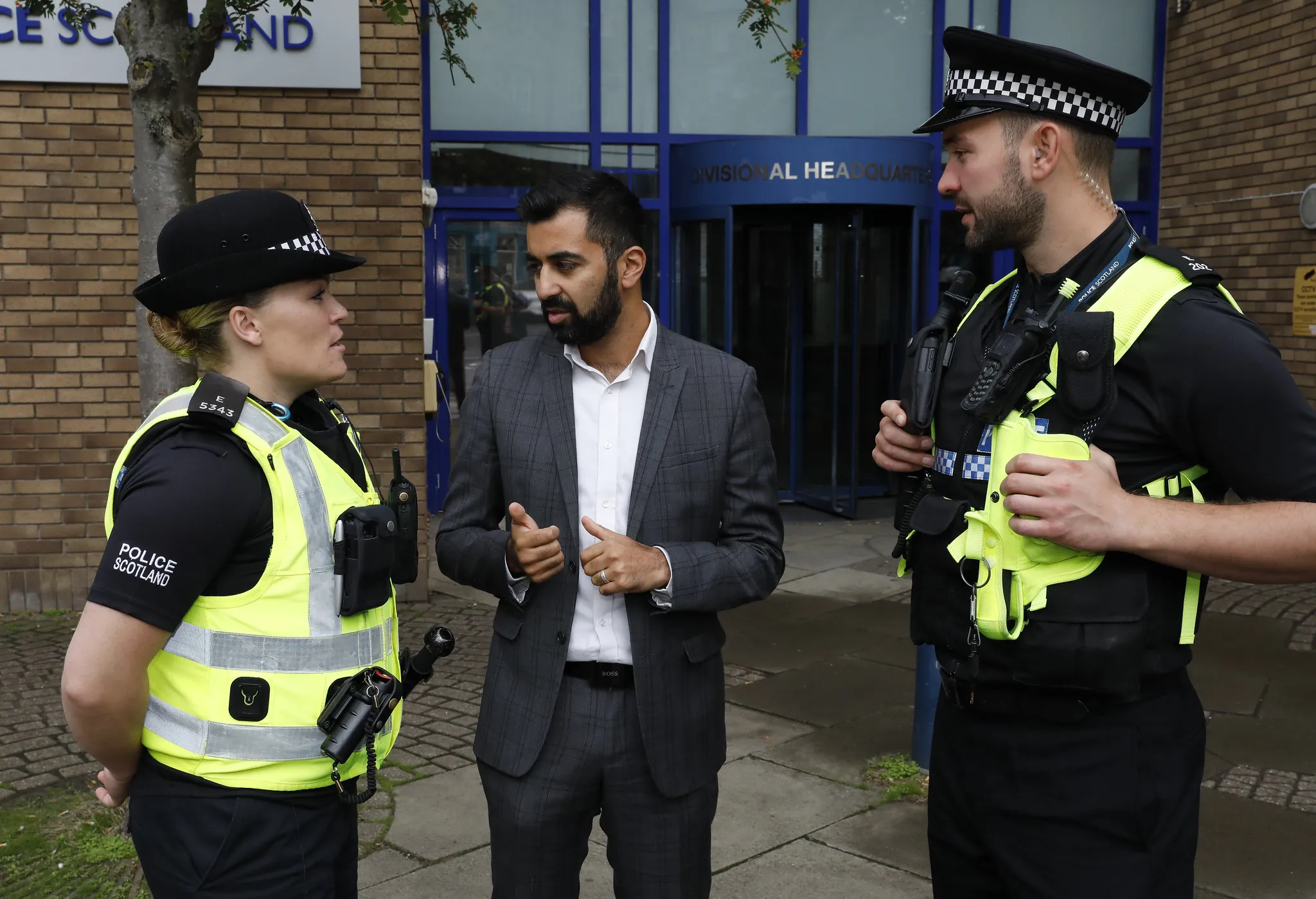 Humza Yousef, Scottish Justice Secretary, speaks with police officers, August 2018. ?w=200&h=150