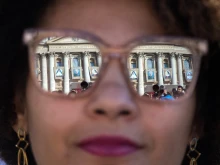 A pilgrim attends the canonization of St. John Henry Newman in Rome, Oct. 13, 2019.