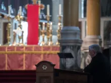 Cardinal Vincent Nichols prays in Westminster Cathedral, London, March 22, 2020. 