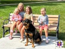 Crisis Response Canines dog Axel visits with community members in Minneapolis after the deadly Annunciation Church shooting there, Sunday, Aug. 31, 2025.