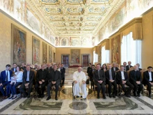 Pope Francis meets with members of the editorship of the theological magazine La Scuola Cattolica at the Vatican's Consistory Hall, June 17, 2022.
