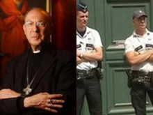 Archbishop Andre-Joseph Leonard and a shot of Belgian police standing guard outside his office.