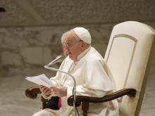 Pope Francis delivers his general audience address to pilgrims in the Paul VI Audience Hall at the Vatican on Dec. 27, 2023.
